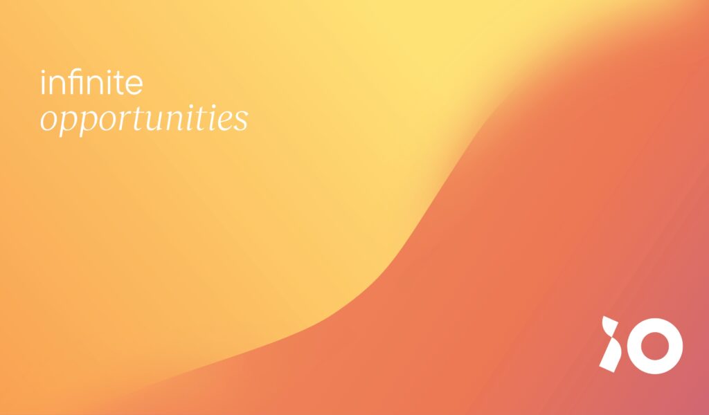 Infinite Opportunities – Orange iO Digital yellow and orange zoom background